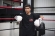 Young boy, white boxing gloves